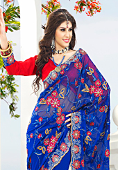 Take the fashion industry by storm in this beautiful embroidered saree. This blue net saree have beautiful embroidery patch work which is embellished with resham, stone and beads work. Fabulous designed embroidery gives you an ethnic look and increasing your beauty. Contrasting red blouse is available. Slight Color variations are possible due to differing screen and photograph resolutions.
