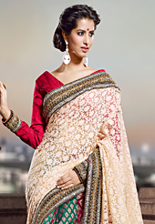 The traditional patterns used on this saree maintain the ethnic look. This cream and multicolor net and banarasi brocada saree have beautiful embroidery patch work which is embellished with zari and sequins work. Fabulous designed embroidery gives you an ethnic look and increasing your beauty. Contrasting red blouse is available. Slight Color variations are possible due to differing screen and photograph resolutions.