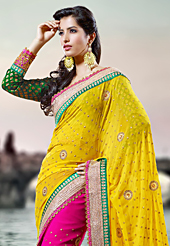 Try out this year top trend, glowing, bold and natural collection. This yellow and pink georgette saree have beautiful embroidery patch work which is embellished with resham, zari, sequins, stone and lace work. Fabulous designed embroidery gives you an ethnic look and increasing your beauty. Contrasting green blouse is available. Slight Color variations are possible due to differing screen and photograph resolutions.