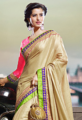 The evolution of style species collection spells pure femininity. This beige art silk saree have beautiful embroidery patch work which is embellished with zari work. Fabulous designed embroidery gives you an ethnic look and increasing your beauty. Contrasting pink blouse is available. Slight Color variations are possible due to differing screen and photograph resolutions.