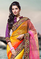 Let your personality articulate for you with this amazing embroidered saree. This yellow and pink net saree have beautiful embroidery patch work which is embellished with resham, zari and stone work. Fabulous designed embroidery gives you an ethnic look and increasing your beauty. Contrasting purple blouse is available. Slight Color variations are possible due to differing screen and photograph resolutions.