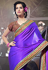 Take a look on the changing fashion of the season. This violet satin saree have beautiful embroidery patch work which is embellished with resham and sequins work. Fabulous designed embroidery gives you an ethnic look and increasing your beauty. Contrasting pink blouse is available. Slight Color variations are possible due to differing screen and photograph resolutions.