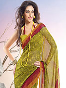 Be the cynosure of all eyes with this exquisite range of party wear sarees in flattering colors and combinations. This collection of printed georgette sarees ,flaunt your feminine grace and glamour in this smart and trendy wear collection of sarees. Slight Color variations possible due to differing screen and photograph resolutions.