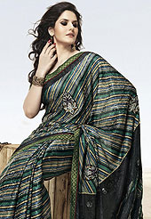 Symbol of fashion and beauty, each piece of our range of chiffon sarees is certain to increase your look. This collection of printed chiffon sarees, flaunt your feminine grace and glamour in this smart and trendy wear collection of sarees. Fantastic Lines print work on saree and graceful combination of fine embroidery butti on all over saree. Slight Color variations possible due to differing screen and photograph resolutions.