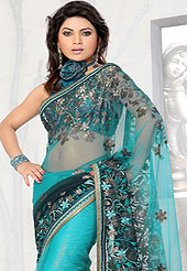 Be the cynosure of all eyes with this exquisite range of party wear sarees in flattering colors and combinations. This collection of Net Sarees ,flaunt your feminine grace and glamour in this smart and classic wear collection of sarees. Designer  Saree in material  with net embellished  with heavy embroidery, sitara work and gota patti all over the saree. Slight Color variations possible due to differing screen and photograph resolutions.