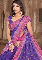The traditional patterns used on this saree maintain the ethnic look. This Purple color saree make you trendy look. This Drape has a beautiful handwork of sitara, dhaga, stone work. Floral butti and border make different to others. Color blend of this saree is nice. Matching designer is blouse. This saree is also available in Violet, Green, Red, Purple colors. Slight color variations are possible due to differing screen and photograph resolution.  