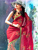 Symbol of fashion and beauty, each piece of our range of printed sarees is certain to increase your look.  It’s cool and has a very modern look to impress all. This saree is embellished with leheriya print work all over the saree with floral patch on pallu. Mixing of colors make different to others. Matching blouse is available. Slight Color variations are possible due to differing screen and photograph resolutions.