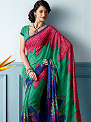 Make a remarkable fashion statement this season with this printed saree. This beautiful and pretty printed saree nicely designed with Stylish floral pattern. The saree is specially crafted for your stunning look and terrific style. This saree material is georgette. Matching Blouse is available. Slight color variations are possible due to differing screen and photograph resolution.