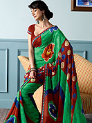 Be the cynosure of all eyes with this wonderful casual wear saree in flattering colors and combinations. This beautiful and pretty printed saree nicely designed with Stylish flower and circles pattern. The saree is specially crafted for your stunning look and terrific style. This saree material is georgette. Matching Blouse is available. Slight color variations are possible due to differing screen and photograph resolution.