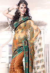 Style and trend will be at the peak of your beauty when you adorn this saree. This orange net and faux georgette saree is beautifully adorned with resham, sequins, zari and patch work in floral patterns. As shown blouse can be made possible and also can be customized as per your style subject to fabric limitation.  Slight color variations are possible due to differing screen and photograph resolution.