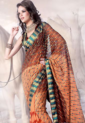 Era with extension in fashion, style, Grace and elegance have developed grand love affair with this ethnical wear.This deep peach and rust faux georgette saree is beautifully adorned with resham, zari and patch work in floral patterns. As shown blouse can be made possible and also can be customized as per your style subject to fabric limitation.  Slight color variations are possible due to differing screen and photograph resolution.