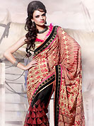 Welcome to the new era of Indian fashion wear. This fawn and black faux georgette and net saree is beautifully adorned with resham, zari, sequins and patch work in floral patterns. As shown blouse can be made possible and also can be customized as per your style subject to fabric limitation.  Slight color variations are possible due to differing screen and photograph resolution.
