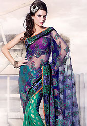 You can be sure that ethnic fashions selections of clothing are taken from the latest trend in today’s fashion. This blue and teal net and faux georgette saree is beautifully embellished with foil print, resham, sequins, cutdana and patch work in floral patterns. As shown blouse can be made possible and also can be customized as per your style subject to fabric limitation.  Slight color variations are possible due to differing screen and photograph resolution.