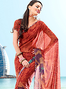 The popularity of this dress comes from the fact that it showcases the beauty modesty as well as exquisitely. This saree is nicely designed with beautiful print work in floral and abstract art pattern. Shades of saree made it attractive and unique to others. Border of saree is nicely designed with piping work. The saree is specially crafted for your stunning look and terrific style with this matching blouse. This saree made with georgette fabric. Slight Color variations are possible due to differing screen and photograph resolutions.