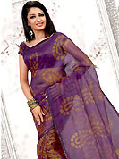 Different colors are a perfect blend of traditional Indian heritage and contemporary artwork. This purple and orange net printed casual wear saree have floral print on all over and paisley print on pallu. Border has amazing contrasting fabric lace. It’s cool and has a very modern look to impress all. Matching blouse is available.  Slight Color variations are possible due to differing screen and photograph resolutions.