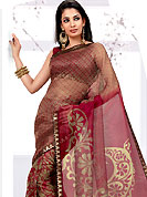 Try out this year top trends, glowing, bold and natural collection. This red and fawn net printed casual wear saree have beautiful floral and butti print work on all over. Border has amazing contrasting fabric lace. It’s cool and has a very modern look to impress all. Matching blouse is available.  Slight Color variations are possible due to differing screen and photograph resolutions.