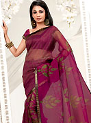 You can be sure that ethnic fashions selections of clothing are taken from the latest trend in today’s fashion. This pink net printed casual wear saree have beautiful floral and geometrical art print work on all over. Border has amazing contrasting fabric lace. It’s cool and has a very modern look to impress all. Matching blouse is available.  Slight Color variations are possible due to differing screen and photograph resolutions.