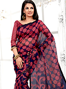 Be the cynosure of all eyes with this wonderful  casual wear in flattering colors and combinations. This pink net printed casual wear saree have beautiful polka dots and floral print work on all over. Border has amazing contrasting fabric lace. It’s cool and has a very modern look to impress all. Matching blouse is available.  Slight Color variations are possible due to differing screen and photograph resolutions.
