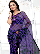 Be the cynosure of all eyes with this wonderful  casual wear in flattering colors and combinations. This violet net printed casual wear saree have beautiful polka dots and floral print work on all over. Border has amazing contrasting fabric lace. It’s cool and has a very modern look to impress all. Matching blouse is available.  Slight Color variations are possible due to differing screen and photograph resolutions.