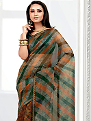 Printed sarees are the best choice for a girl to enhance her feminine look. This orange net printed casual wear saree have beautiful floral butti print work on all over. Border has amazing contrasting fabric lace. It’s cool and has a very modern look to impress all. Matching blouse is available.  Slight Color variations are possible due to differing screen and photograph resolutions.