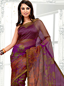 Take the fashion industry by storm in this beautiful printed saree. This purple net printed casual wear saree have beautiful floral, paisley and dots print work on all over. Border has amazing contrasting fabric lace. It’s cool and has a very modern look to impress all. Matching blouse is available.  Slight Color variations are possible due to differing screen and photograph resolutions.
