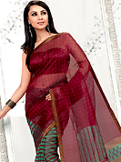 Make a trendy look with this classic printed saree with blouse. This red and teal net printed casual wear saree have beautiful floral, lines and geometrical print work on all over. Border has amazing contrasting fabric lace. It’s cool and has a very modern look to impress all. Matching blouse is available.  Slight Color variations are possible due to differing screen and photograph resolutions.