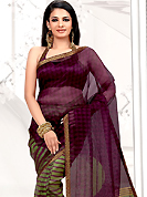 Make a trendy look with this classic printed saree with blouse. This purple and olive net printed casual wear saree have beautiful floral, lines and geometrical print work on all over. Border has amazing contrasting fabric lace. It’s cool and has a very modern look to impress all. Matching blouse is available.  Slight Color variations are possible due to differing screen and photograph resolutions.