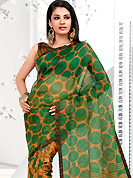 Style and trend will be at the peak of your beauty when you adorn this saree. This yellow and green net printed casual wear saree have beautiful floral and polka dots print work on all over. Border has amazing contrasting fabric lace. It’s cool and has a very modern look to impress all. Matching blouse is available.  Slight Color variations are possible due to differing screen and photograph resolutions.