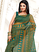 The most radiant carnival of style and beauty. This teal net printed casual wear saree have beautiful zigzag and butti print work on all over. Border has amazing contrasting fabric lace. It’s cool and has a very modern look to impress all. Matching blouse is available.  Slight Color variations are possible due to differing screen and photograph resolutions.