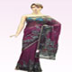 Heavy stone work saree with two shaded blue and gray golden pearl work on all over border