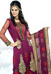 Motivate your look with this purple suit. This amazing suit adorns with embroidery work. Beautiful floral patch done with resham embroidery and grave lace on kameez which is enhanced your personality. Stylish pattern on neck is stunning. Matching churidar and embellished dupatta is available with this. Slight Color variations are possible due to differing screen and photograph resolutions.