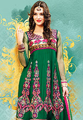 Breathtaking collection of designer suits with stylish embroidery work and fabulous style. This green net suit has beautiful embroidered work on kameez and lace border with nice mixing of huge floral patch and color gives a stylish look. Stylish neck is eye catching to impress all. Matching embroidered dupatta and churidar give you a classic look. Slight Color variations are possible due to differing screen and photograph resolutions.