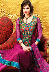 Motivate your look with this purple suit. This amazing suit adorns with embroidery work. Neck is nicely designed with huge floral pattern patch work done with resham threads. Satin lace border on kameez which is enhanced your personality. Butti work on dupatta is stunning and stylish. Matching churidar and embellished dupatta is available with this. Slight Color variations are possible due to differing screen and photograph resolutions.