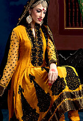 Emblem of fashion and beauty, each piece of our range of embroidery Suits is certain to enhance your look as per today’s trends. This kameez is nicely designed with resham embroidered patch work on bottom and neckline with fabric lace border. Contrasting dupatta and butti worked net sleeves is eye catching to impress all. Matching dupatta and salwaar gives a perfect finish to the entire suit. Slight Color variations are possible due to differing screen and photograph resolutions.