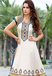 Be the cynosure of all eyes with this wonderful casual wear churidar suit in flattering colors and combinations. This Amazing white georgette suit has print work on kameez with stone and beads embellished patch on neckline and bottom. Fabric lace border and awesomely designed choli pattern give’s you a gorgeous and dazzling look everywhere. Combination of churidar and embroidered dupatta gives a casual look. Slight Color variations are possible due to differing screen and photograph resolutions.