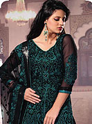 Breathtaking collection of designer suits with stylish embroidery work and fabulous style. This georgette suit has beautiful and fine embossed embroidered work on all over kameez and lace border with nice mixing of turquoise color gives a stylish look. Matching embroidered dupatta and churidar give you a classic look. Slight Color variations are possible due to differing screen and photograph resolutions.