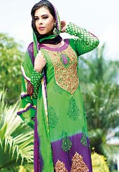 Be the cynosure of all eyes with this wonderful party wear churidar kameez in flattering colors and combinations. This Amazing lime green and violet kameez adorned with floral patterned embroidery patch done with zari and resham work with lace border. This awesomely designed pattern and embroidered brocade sleeves give’s you a gorgeous and dazzling look everywhere. Combination of churidar and embroidered dupatta gives a casual look. Slight Color variations are possible due to differing screen and photograph resolutions.