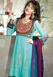 Be the rocker in the party by wearing this cool sky blue wear. The dazzling kameez have amazing rich embroidered floral patch work on all over done with zari and resham with lace border. This suit is made with faux georgette fabric. Matching embroidered dupatta and churidar is available with this suit. The entire ensemble makes an excellent wear and make you different to others. Slight Color variations are possible due to differing screen and photograph resolutions.