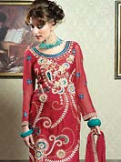 Get magnetic clad in this designer suit. The dazzling kameez have amazing rich embroidered floral patch work on all over done with zari and resham with lace border. This suit is made with faux georgette fabric. Matching embroidered dupatta and churidar is available with this suit. The entire ensemble makes an excellent wear and make you different to others. Slight Color variations are possible due to differing screen and photograph resolutions.