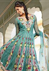 Be ready to slip in the comfort zone of this turquoise net anarkali suit. The dazzling kameez have amazing floral patch work on neckline and bottom area done with zari, stone, sequins, diamonds, beads, resham and lace border. Stylish neck pattern is stunning and gives a pretty look. Matching embroidered dupatta and churidar is available. This drape material is net with inner. The entire ensemble makes an excellent wear. This suit is made with net fabric. Slight Color variations are possible due to differing screen and photograph resolutions.