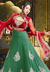 Era with extension in fashion, style, Grace and elegance have developed grand love affair with this ethnical wear. This amazing anarkali suit has long kameez which is designed with beautiful urban floral patch work done with sequins, zari and resham work and lace border. Embroidered and stylish choli is specially crafted for your remarkable look. This drape material is net. Matching churidar and embroidered dupatta is available. Slight color variations are possible due to differing screen and photograph resolutions.
