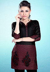 This Burgundy and Black Readymade Indo Western Tunic. This tunic is nicely designed with floral embroidery work done with cotton thread. This is perfect casual wear readymade tunics. This is made with linen cotton fabric. Slight color variations are possible due to differing screen and photograph resolution.
