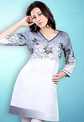 This White and Yellow Readymade Indo Western Tunic. This tunic is nicely designed with floral embroidery work done with cotton thread. This is perfect casual wear readymade tunics. This is made with linen cotton fabric. Slight color variations are possible due to differing screen and photograph resolution.