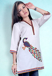 This White Readymade Indo Western Tunic. This tunic is nicely designed with floral embroidery work done with cotton thread. This is perfect casual wear readymade tunics. This is made with linen cotton fabric. Slight color variations are possible due to differing screen and photograph resolution.