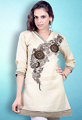 This Cream and Brown Readymade Indo Western Tunic. This tunic is nicely designed with floral embroidery work done with cotton thread. This is perfect casual wear readymade tunics. This is made with linen cotton fabric. Slight color variations are possible due to differing screen and photograph resolution.