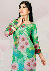 This green cotton tunic is nicely designed with floral print and lace work in fabulous style. This is a perfect casual wear. This is made with cotton fabric. Bottom shown in the image is just for photography purpose. Slight color variations are possible due to differing screen and photograph resolution.