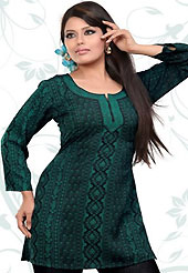 This turquoise green and black american crepe readymade tunic is nicely designed with floral and geometric print and patch work. This is a perfect casual wear readymade kurti. Bottom shown in the image is just for photography purpose. Minimum quantity order 12pcs in each style. Slight Color variations are possible due to differing screen and photograph resolutions.