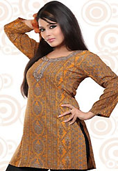 This dark yellow american crepe readymade tunic is nicely designed with floral print work. This is a perfect casual wear readymade kurti. Bottom shown in the image is just for photography purpose. Minimum quantity order 12pcs in each style. Slight Color variations are possible due to differing screen and photograph resolutions.