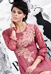 Let your personality articulate for you with this amazing embroidered kurti. This beautiful designer dark onion pink georgette and brocade readymade tunic have amazing embroidery patch work is done with resham and lace work. The entire ensemble makes an excellent wear. This is a perfect patry wear readymade kurti. Accessories shown in the image is just for photography purpose. Slight Color variations are possible due to differing screen and photograph resolutions.